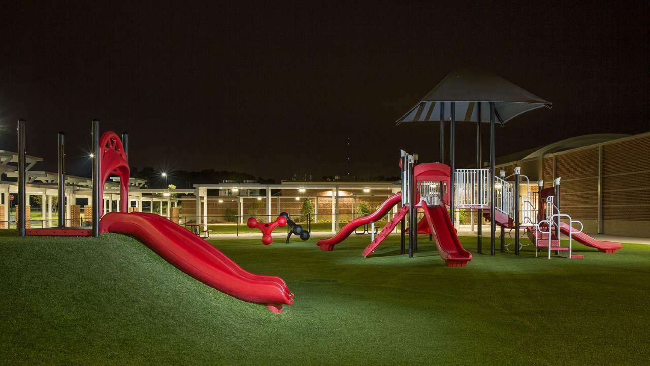 Nighttime artificial turf playground by Southwest Greens of Connecticut